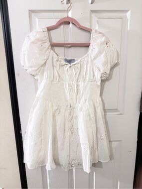 Celebrity Pink Ruffled Neckline Mini Dress